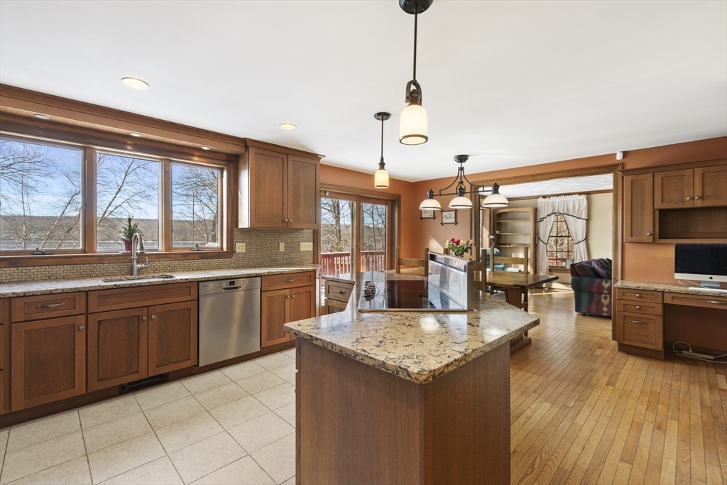 162 South Shore Road Burrillville, RI 02859 - Photo 19 of 39 a large kitchen with granite countertop a large counter top space appliances and cabinets