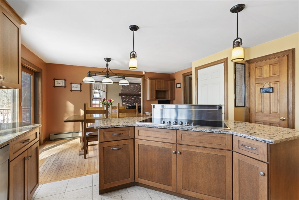 162 South Shore Road Burrillville, RI 02859 - Photo 20 of 39 a kitchen with white cabinets and sink