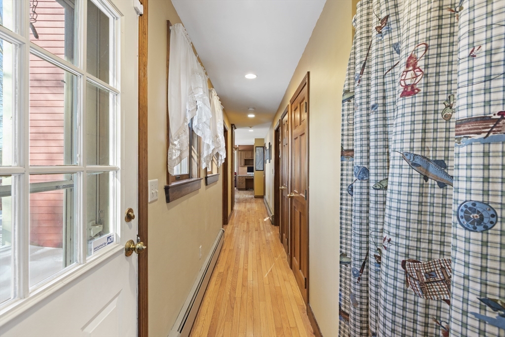 162 South Shore Road Burrillville, RI 02859 - Photo 27 of 39 a view of a hallway with wooden floor