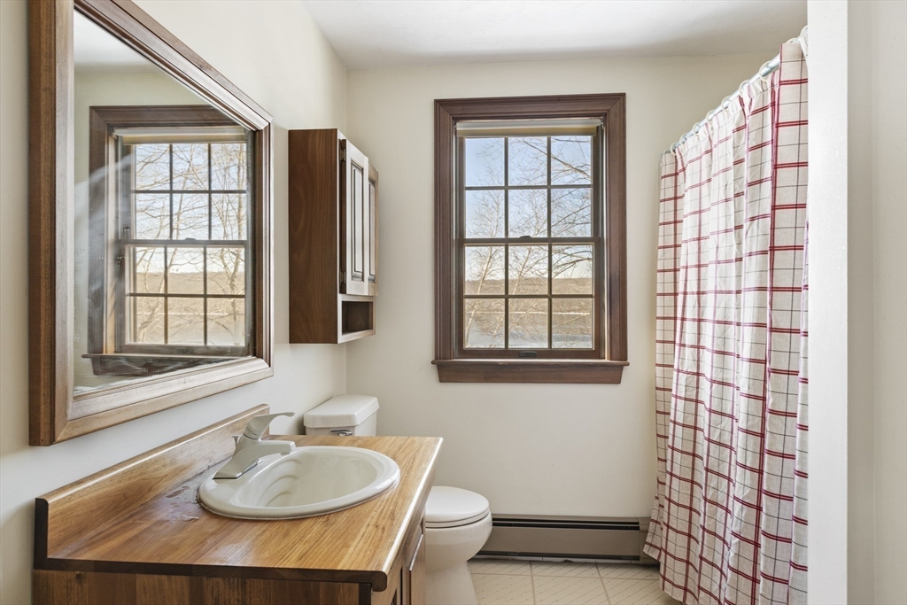 162 South Shore Road Burrillville, RI 02859 - Photo 29 of 39 a bathroom with a sink toilet and shower