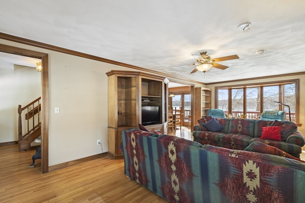 162 South Shore Road Burrillville, RI 02859 - Photo 10 of 39 a living room with furniture and a flat screen tv