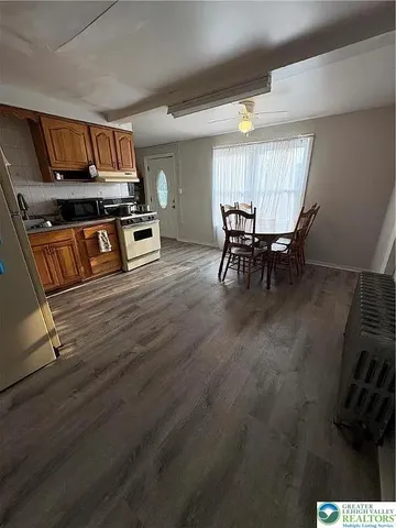 a view of kitchen and microwave