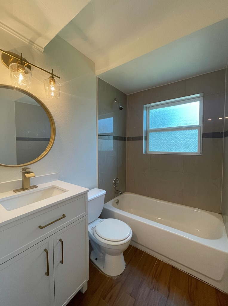 3106 Duval Street, Unit 101 Austin, TX 78705 - Photo 19 of 25 Full bathroom with vanity, shower combination, and dark wood-style floors