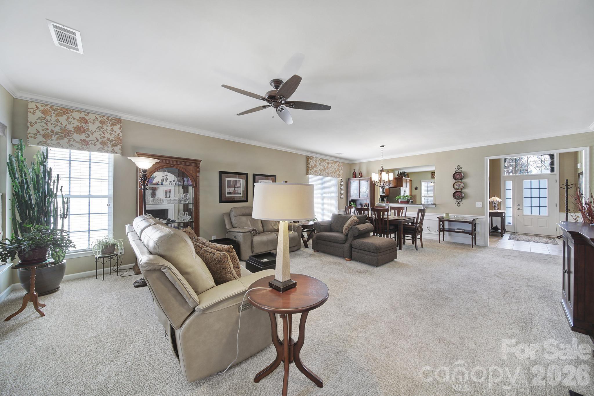 52083 Longspur Lane Fort Mill, SC 29707 - Photo 12 of 48 a living room with furniture and a large window