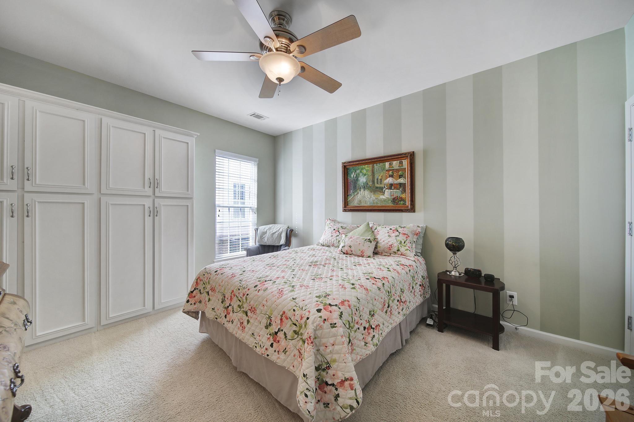 52083 Longspur Lane Fort Mill, SC 29707 - Photo 23 of 48 a bedroom with a bed and a window