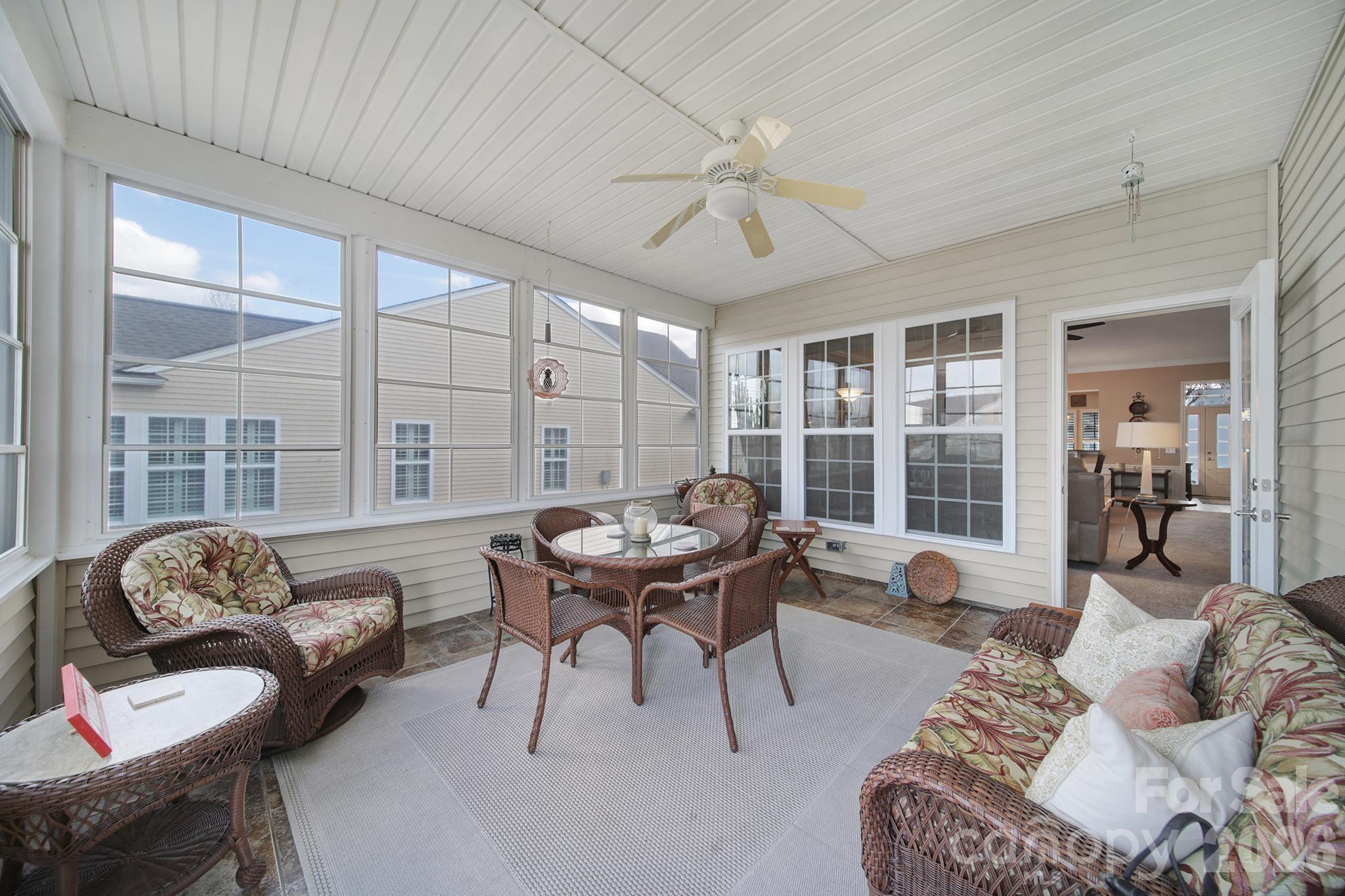 52083 Longspur Lane Fort Mill, SC 29707 - Photo 27 of 48 a living room with furniture and a large window