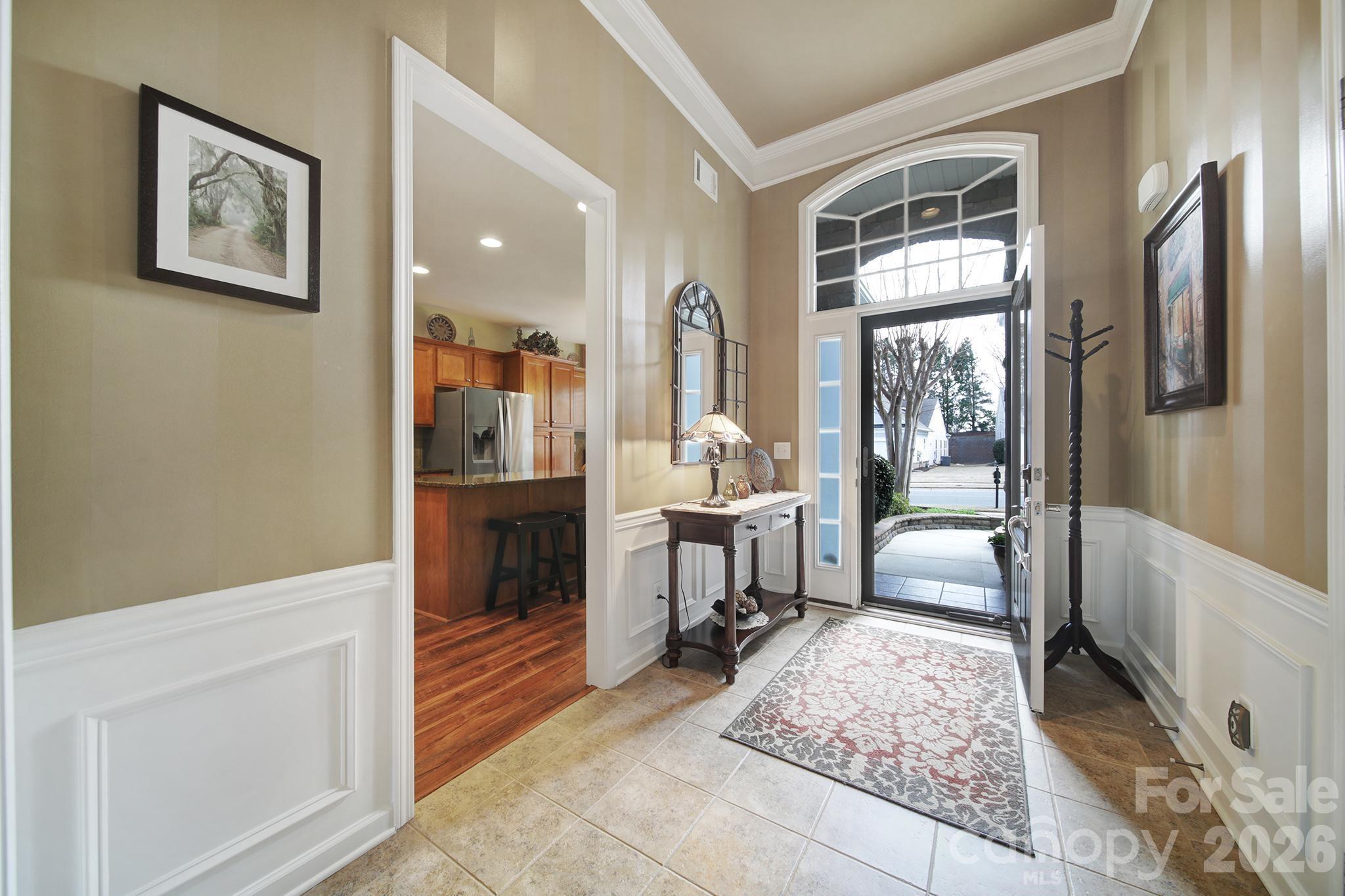 52083 Longspur Lane Fort Mill, SC 29707 - Photo 3 of 48 a view of a hallway with furniture and a livingroom