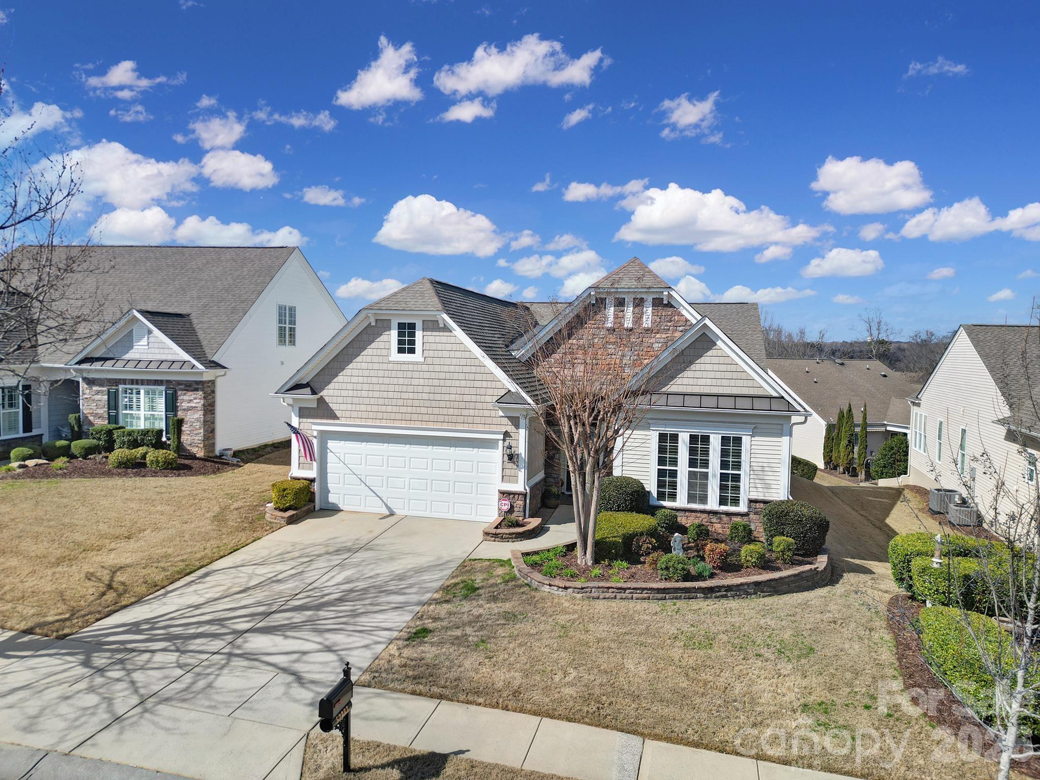 52083 Longspur Lane Fort Mill, SC 29707 - Photo 33 of 48 a front view of a house with garden