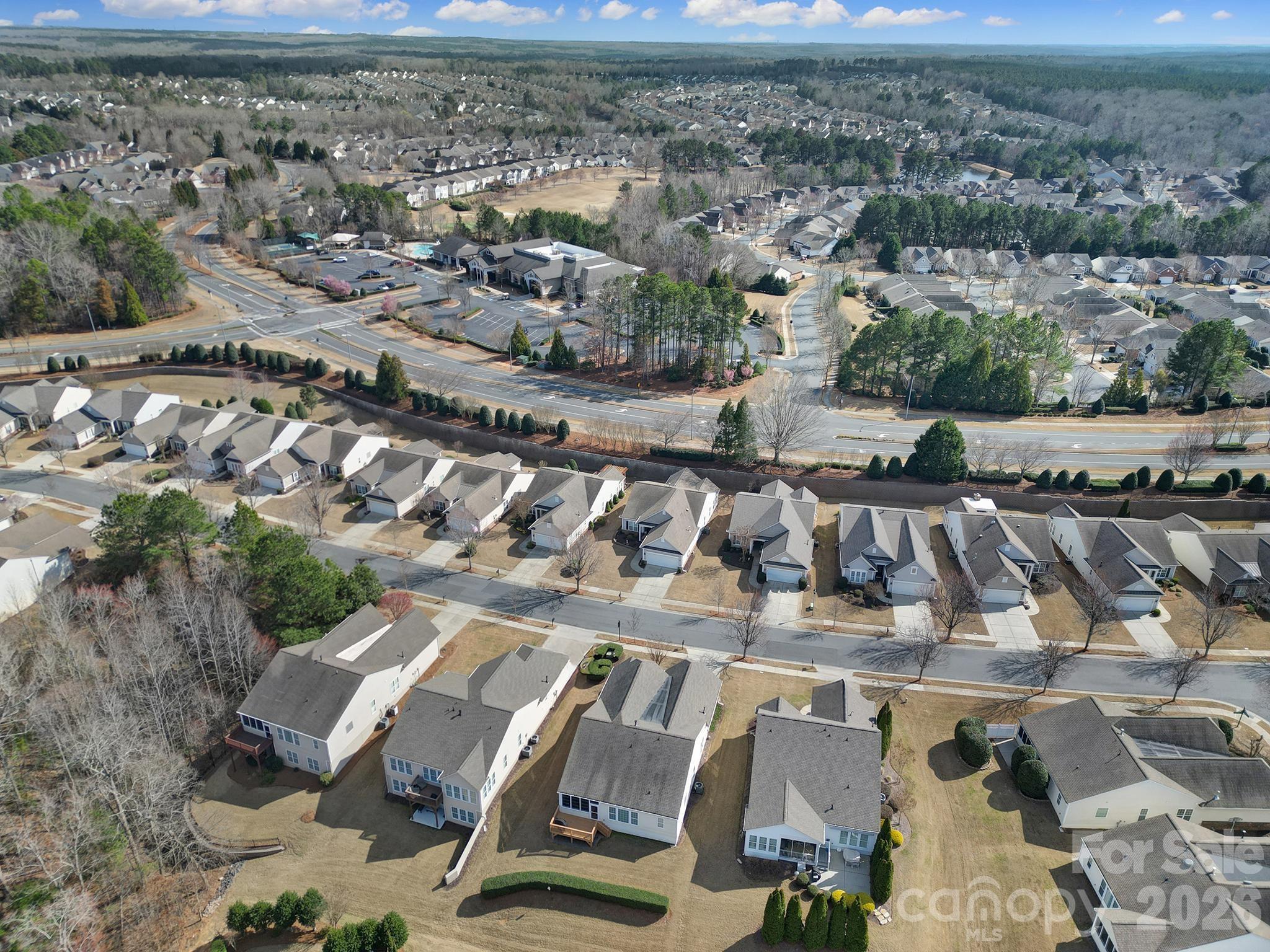 52083 Longspur Lane Fort Mill, SC 29707 - Photo 37 of 48 an aerial view of a yard with horses