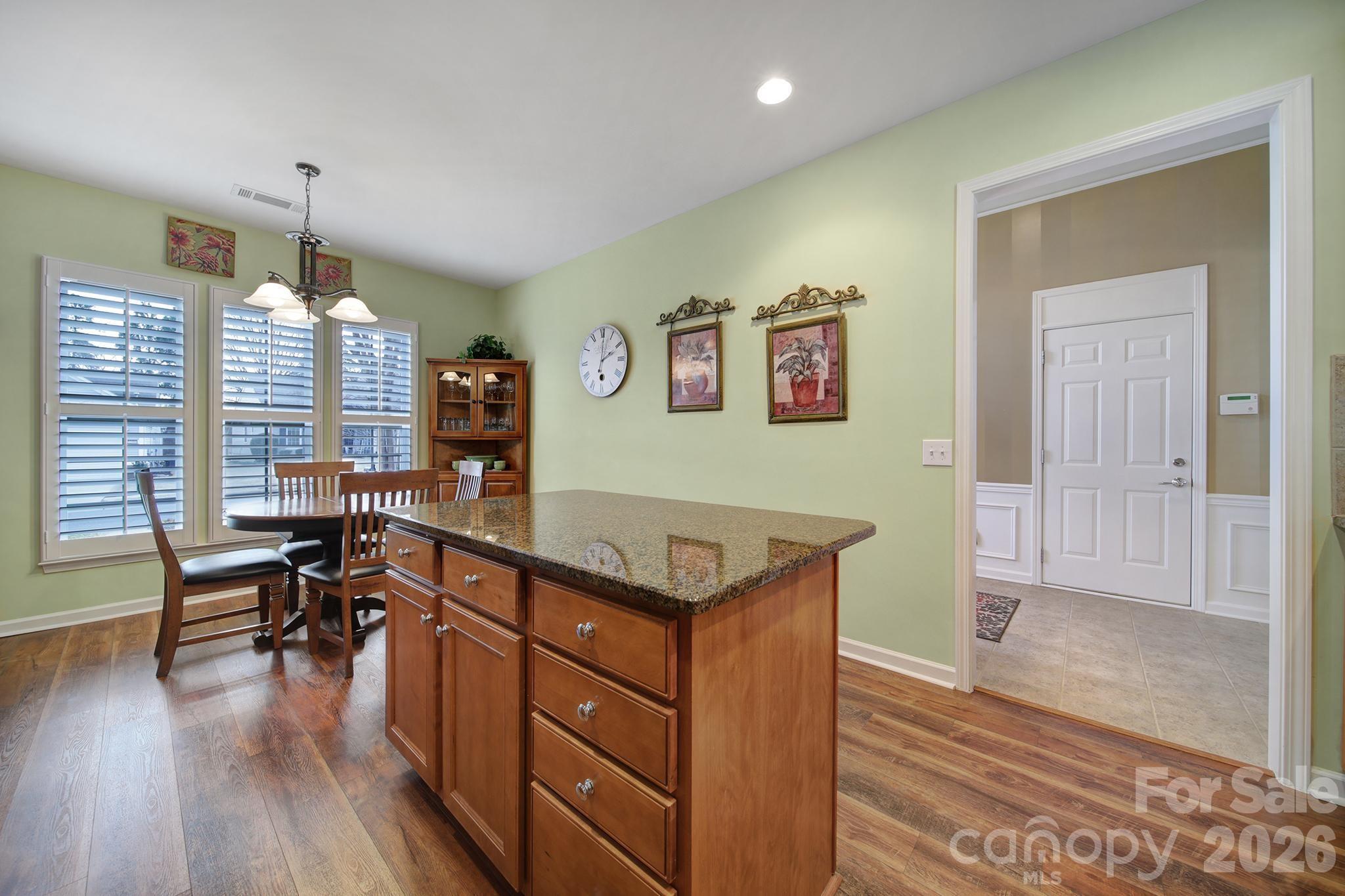 52083 Longspur Lane Fort Mill, SC 29707 - Photo 6 of 48 a room with furniture and a wooden floor