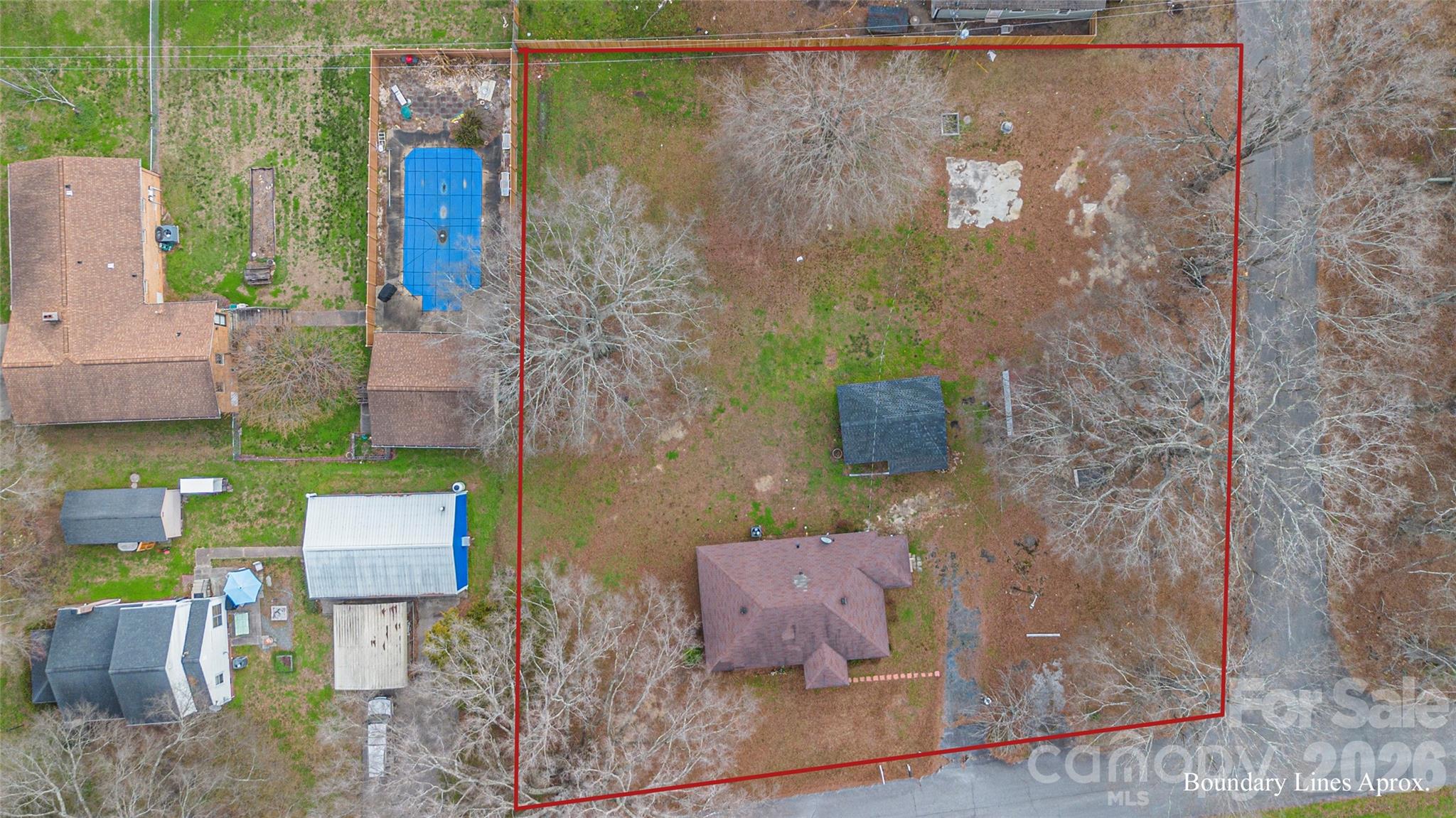 view of a bathroom with a shower curtain and a mirror