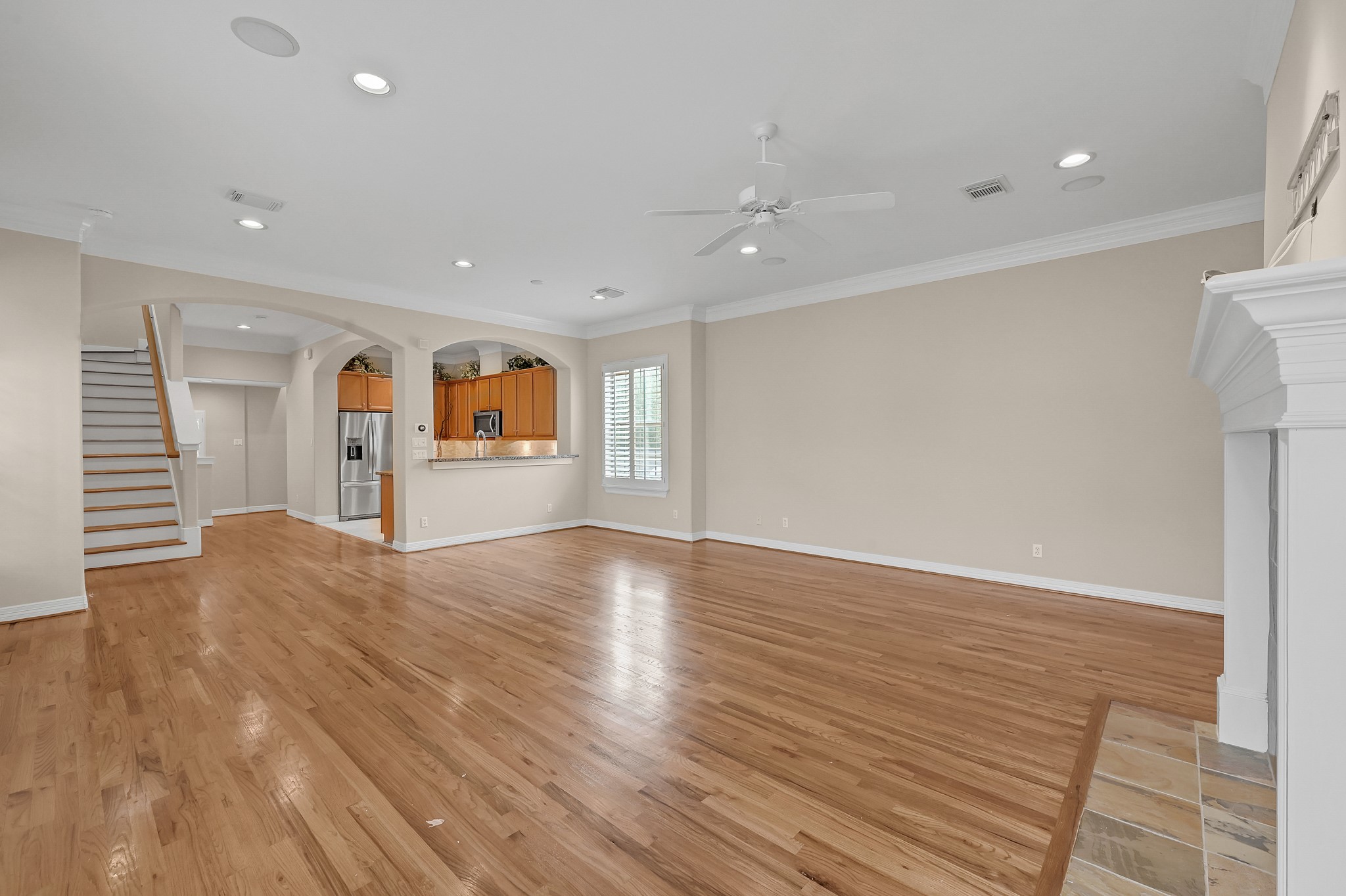 1204 Cohn Street Houston, TX 77007 - Photo 13 of 25 a view of an empty room with a window and fireplace