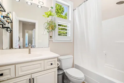 $975,000 | 212 Middlegreen Place, Holly Springs, NC 27540