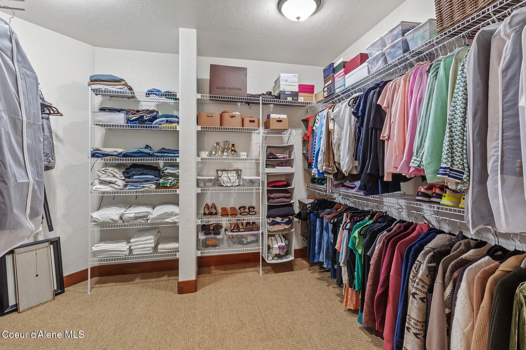 3674 East Basin Falls Road Hayden, ID 83835 - Photo 34 of 70 Expansive Primary Walk-In Closet