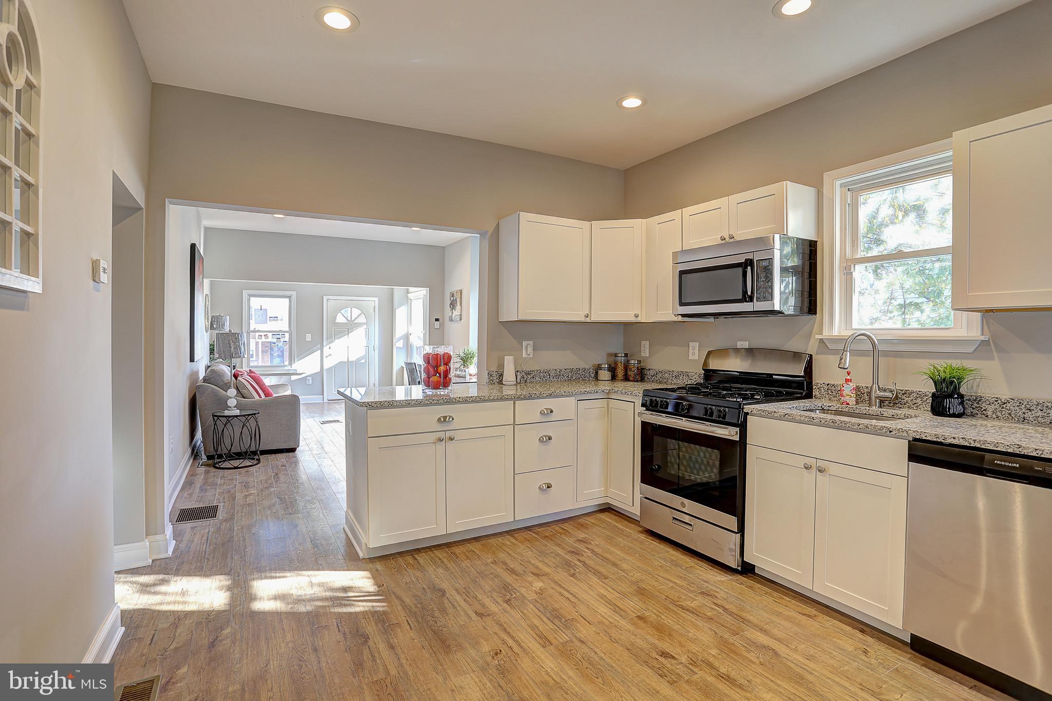 203 West Edgevale Road Baltimore, MD 21225 - Photo 26 of 26 bright open floor plan