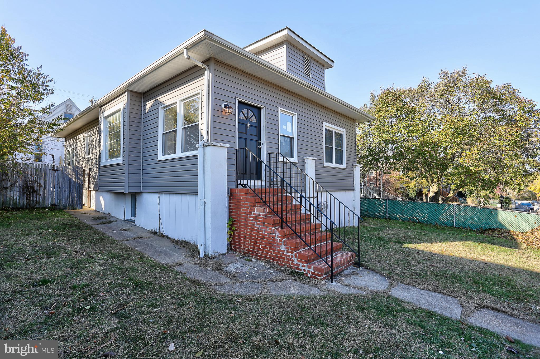 203 West Edgevale Road Baltimore, MD 21225 - Photo 6 of 26 front view will have black steps this week