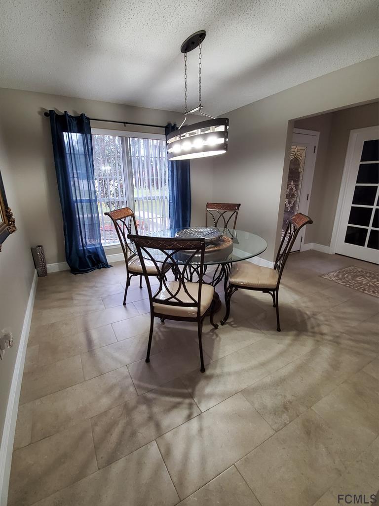 44 Riddle Drive Palm Coast, FL 32164 - Photo 13 of 49 Formal Dining area
