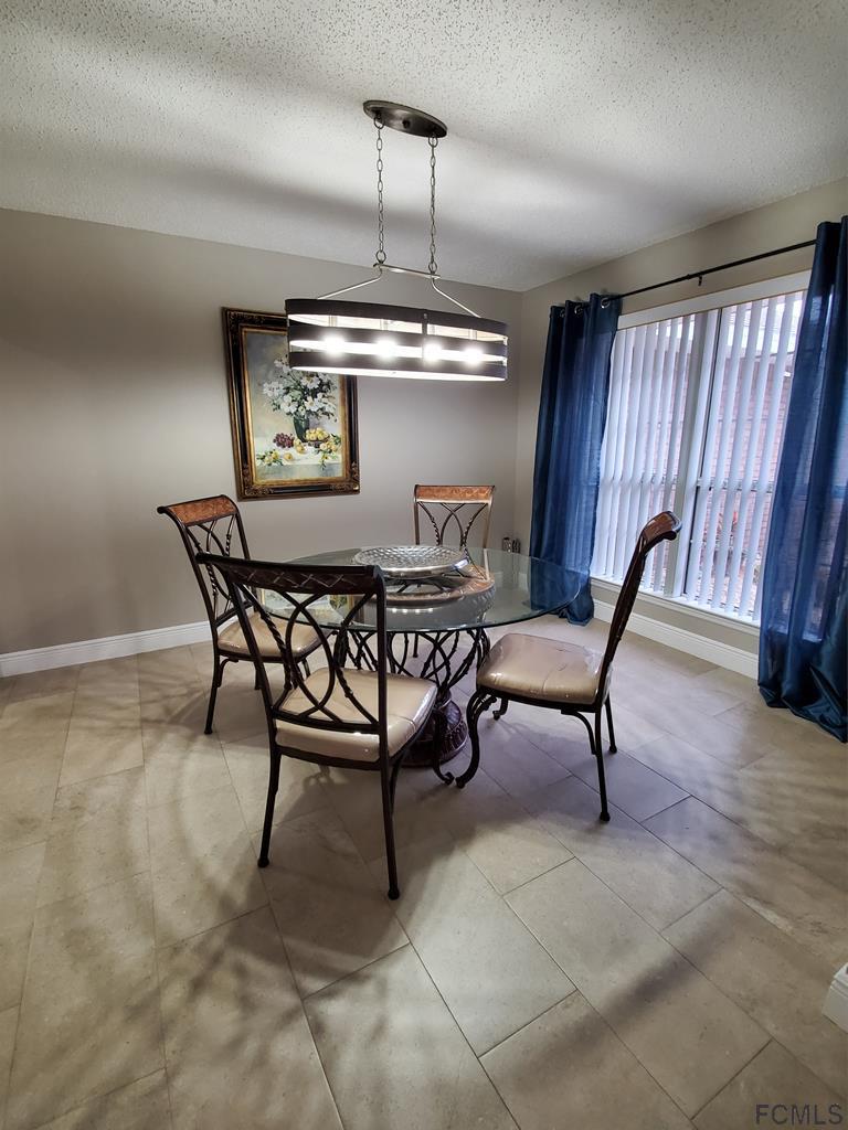 44 Riddle Drive Palm Coast, FL 32164 - Photo 14 of 49 Formal Dining area
