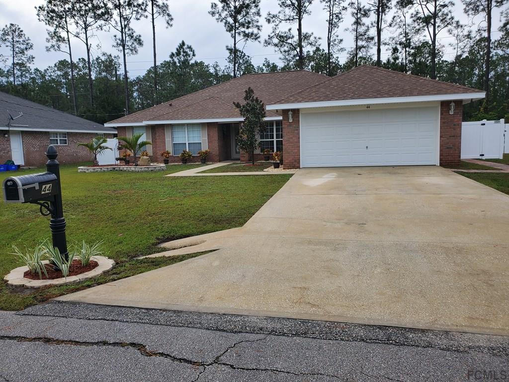44 Riddle Drive Palm Coast, FL 32164 - Photo 3 of 49 Front