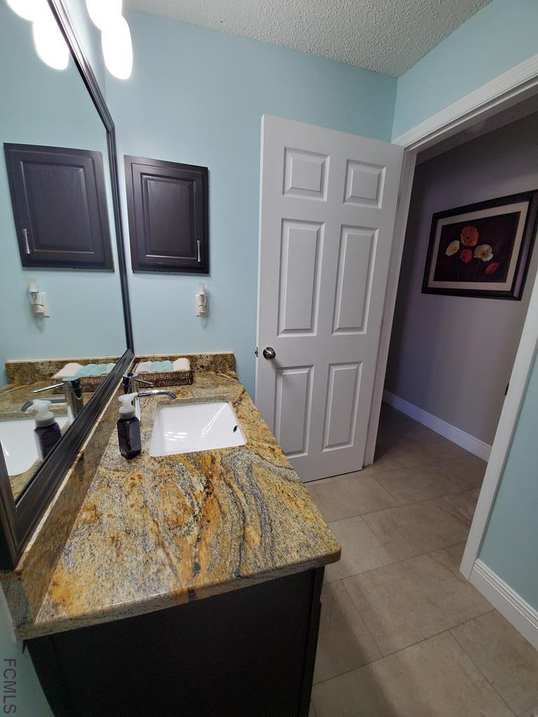 44 Riddle Drive Palm Coast, FL 32164 - Photo 33 of 49 Guest Bathroom