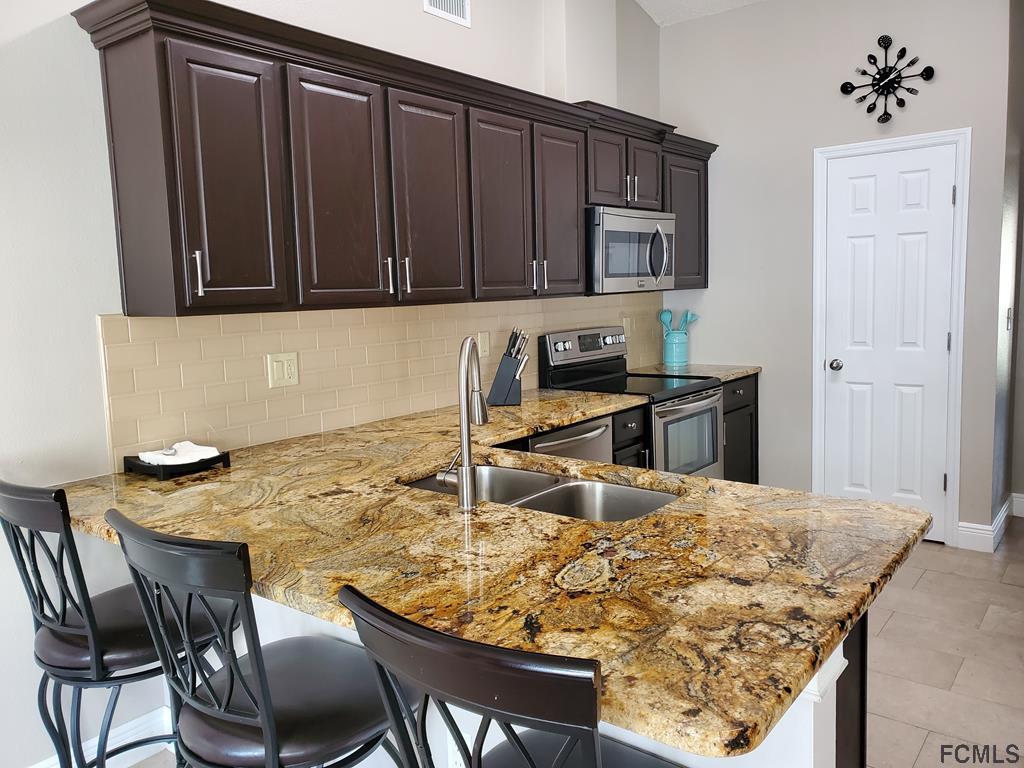 44 Riddle Drive Palm Coast, FL 32164 - Photo 40 of 49 Kitchen