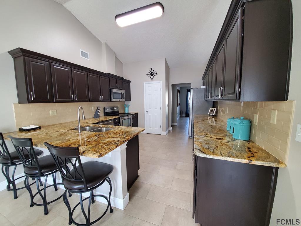 44 Riddle Drive Palm Coast, FL 32164 - Photo 43 of 49 Kitchen