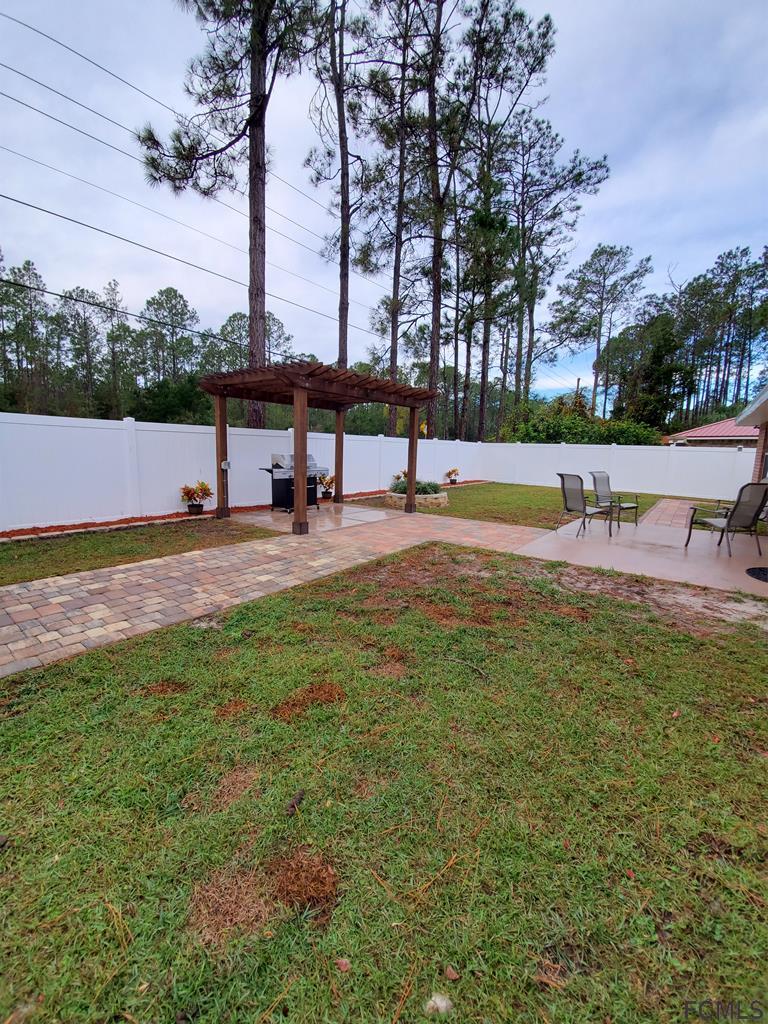 44 Riddle Drive Palm Coast, FL 32164 - Photo 46 of 49 Backyard