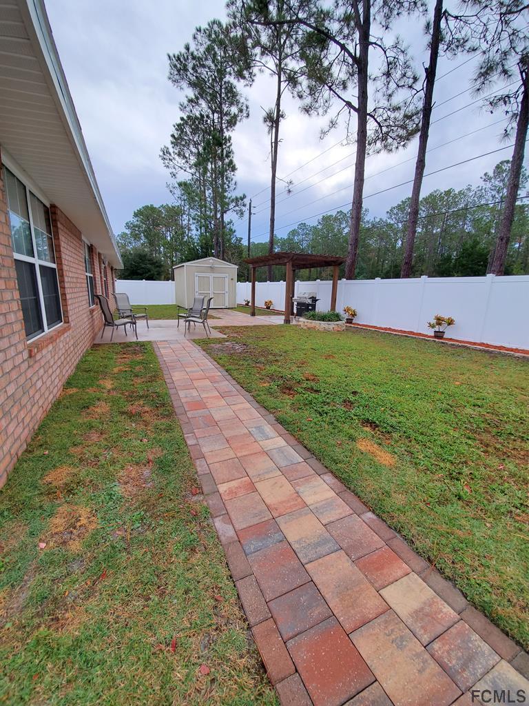 44 Riddle Drive Palm Coast, FL 32164 - Photo 48 of 49 Backyard