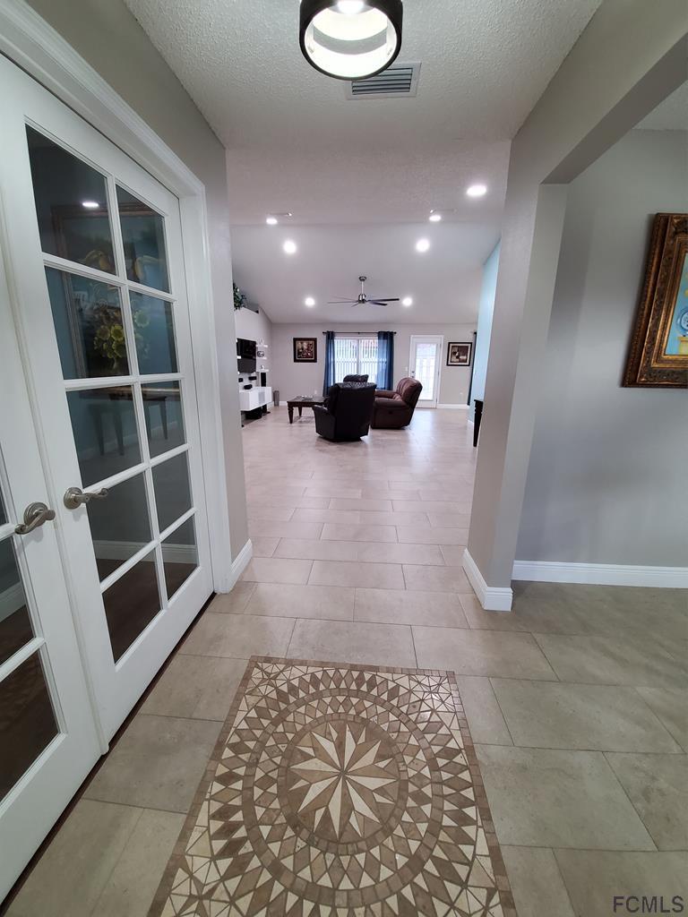 44 Riddle Drive Palm Coast, FL 32164 - Photo 6 of 49 Entry