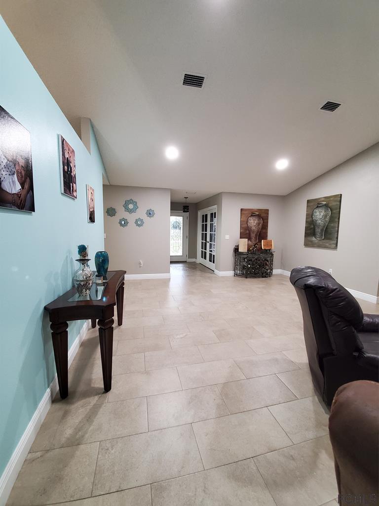 44 Riddle Drive Palm Coast, FL 32164 - Photo 9 of 49 Florida / Great Room
