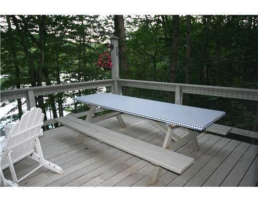 167 Lower Coffee Pond Road Casco, ME 04015 - Photo 6 of 19 Exterior Front. Picnic table on deck