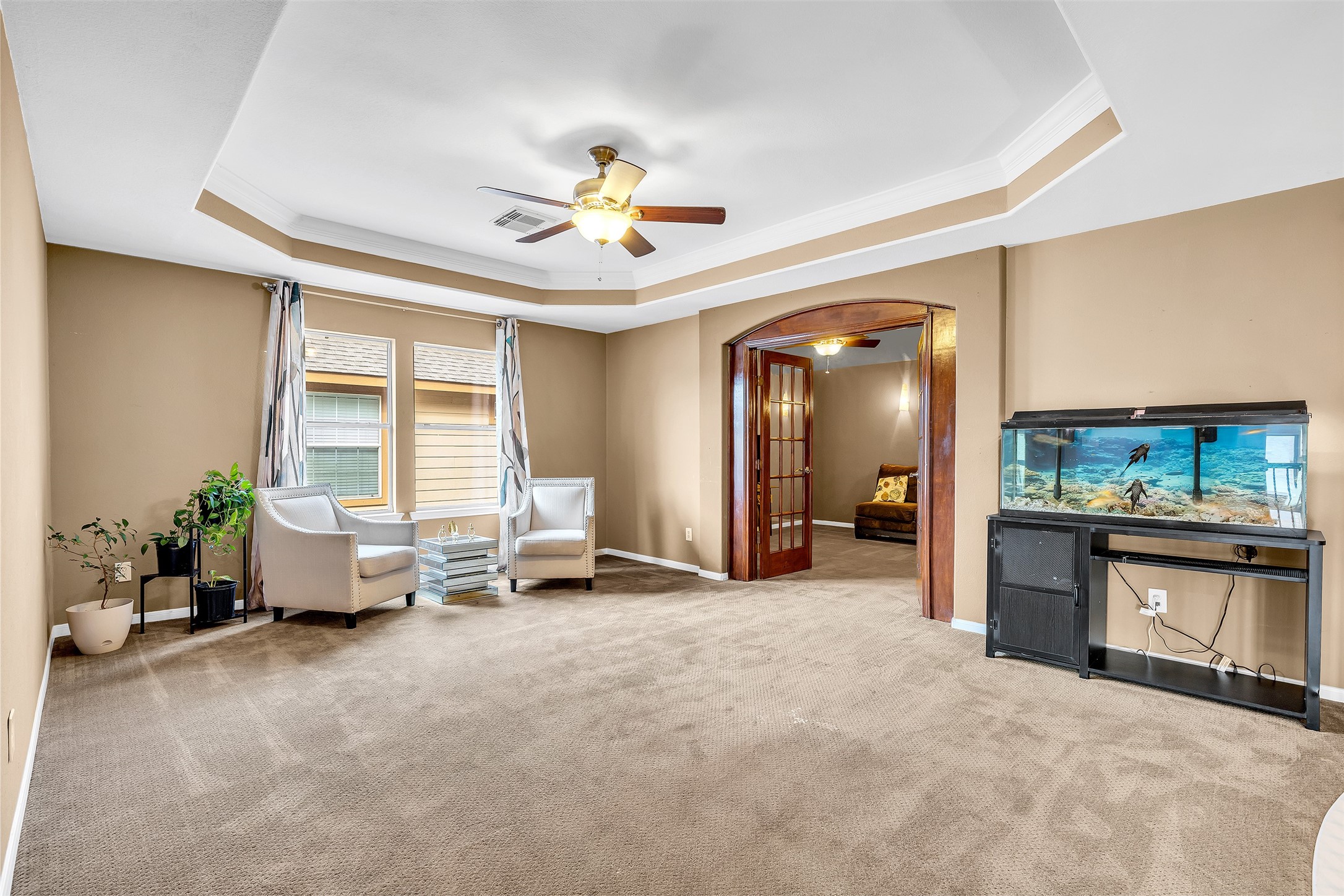 611 River Delta Lane Rosenberg, TX 77469 - Photo 27 of 39 a view of a livingroom with a furniture and a ceiling fan