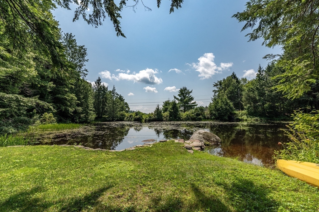 32 Pond Hill Road Goshen, MA 01096 - Photo 21 of 24 a view of a lake with green space