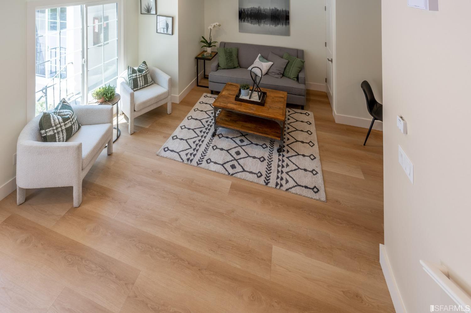 951 University Avenue Berkeley, CA 94710 - Photo 18 of 34 a living room with furniture and a couch