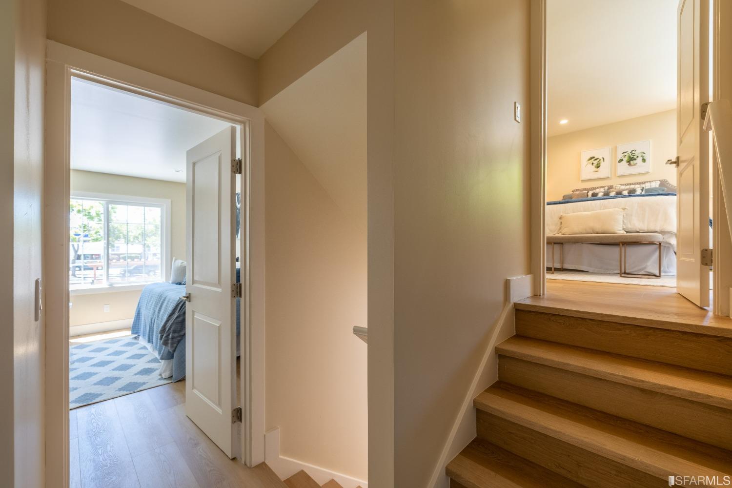 951 University Avenue Berkeley, CA 94710 - Photo 19 of 34 a view of a hallway with wooden floor and a bathroom