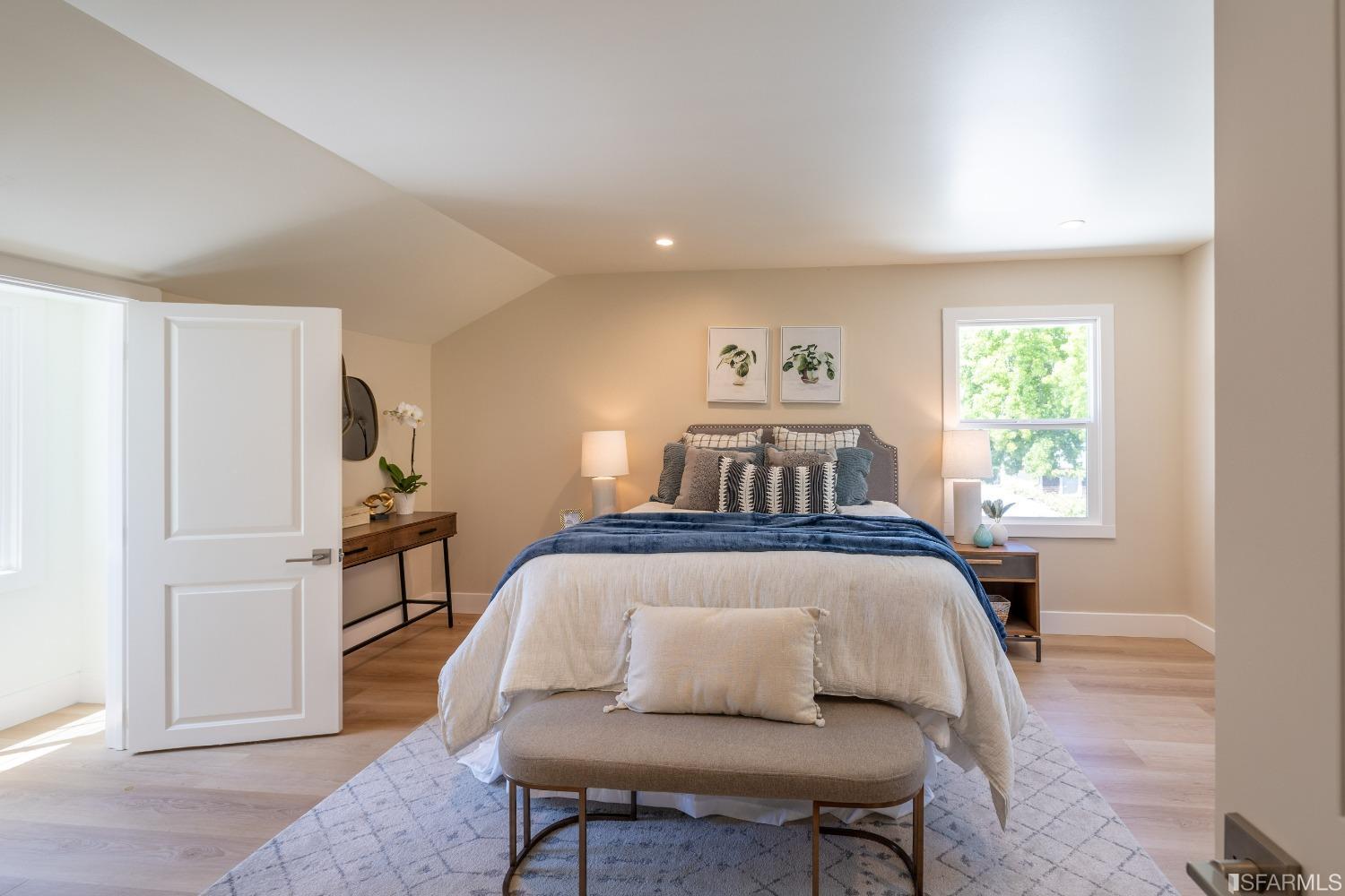 951 University Avenue Berkeley, CA 94710 - Photo 24 of 34 a bedroom with a bed and a window