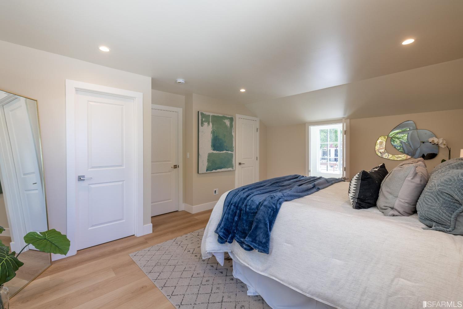951 University Avenue Berkeley, CA 94710 - Photo 25 of 34 a bedroom with a bed and a window