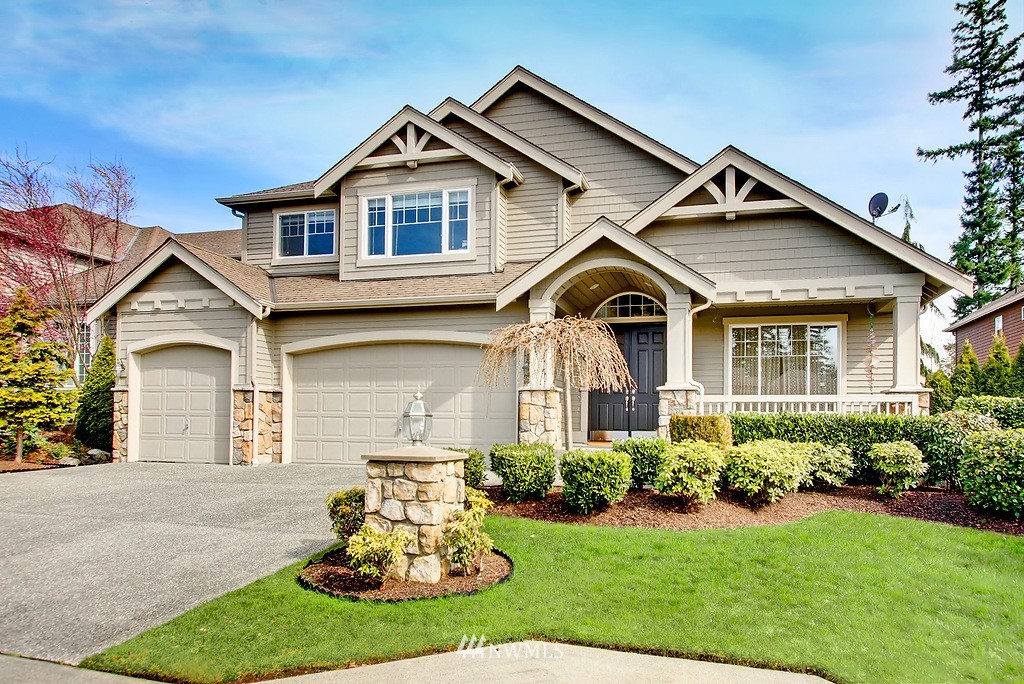 20731 37th Avenue Southeast Bothell, WA 98021 - Photo 1 of 1 a front view of a house with a yard