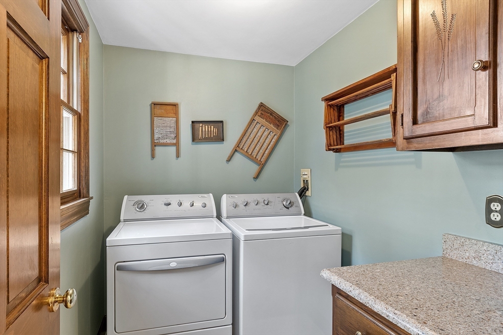426 River Road Andover, MA 01810 - Photo 24 of 42 a utility room with dryer and washer