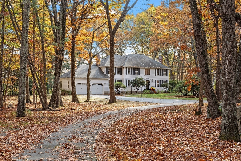 426 River Road Andover, MA 01810 - Photo 3 of 42 a house that has a tree in front of it