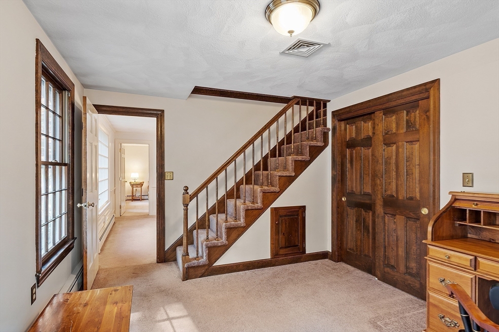 426 River Road Andover, MA 01810 - Photo 34 of 42 a view of an entryway with staircase