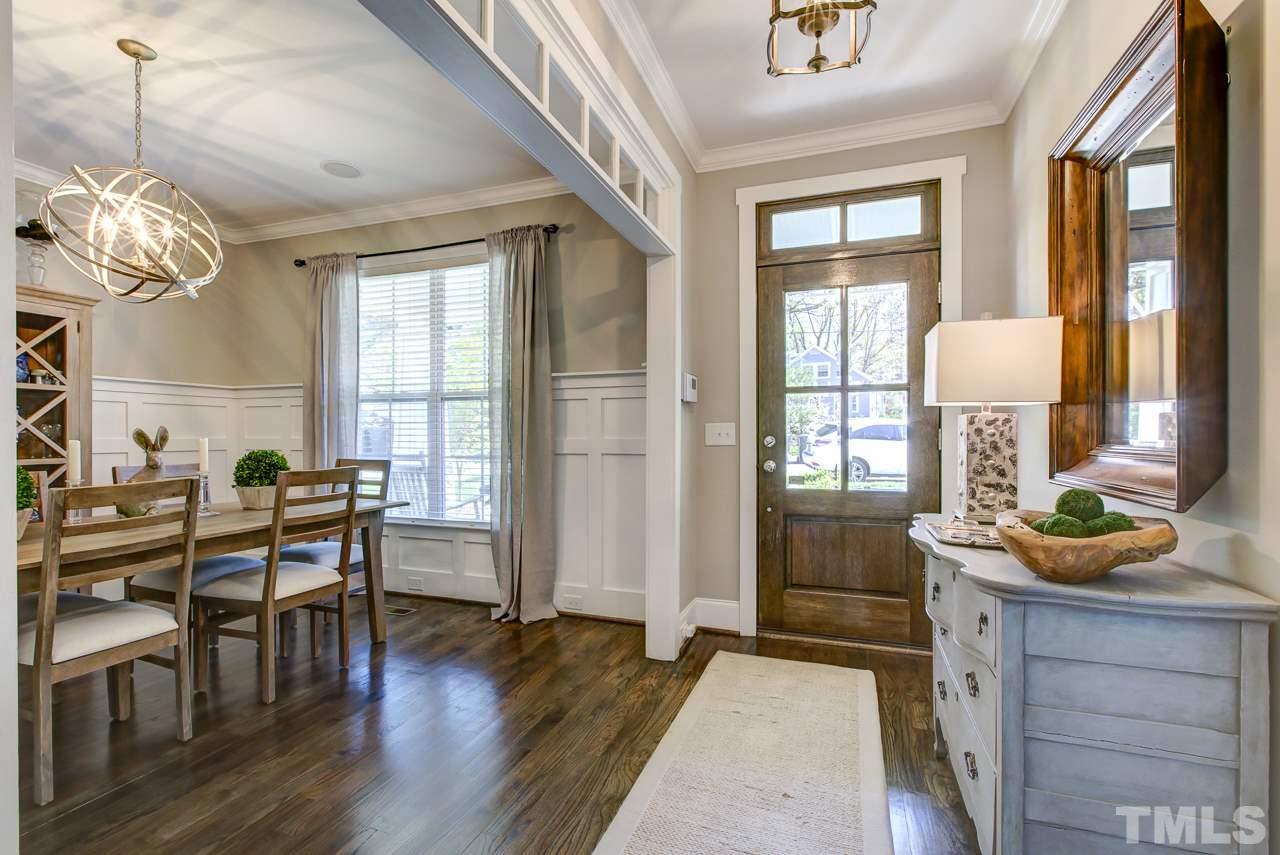 1711 Center Road Raleigh, NC 27608 - Photo 2 of 25 a view of a dining room with furniture and window