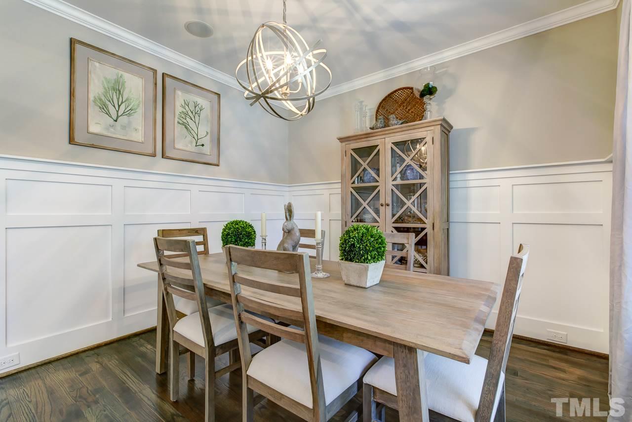 1711 Center Road Raleigh, NC 27608 - Photo 8 of 25 a view of a dining room with furniture and wooden floor