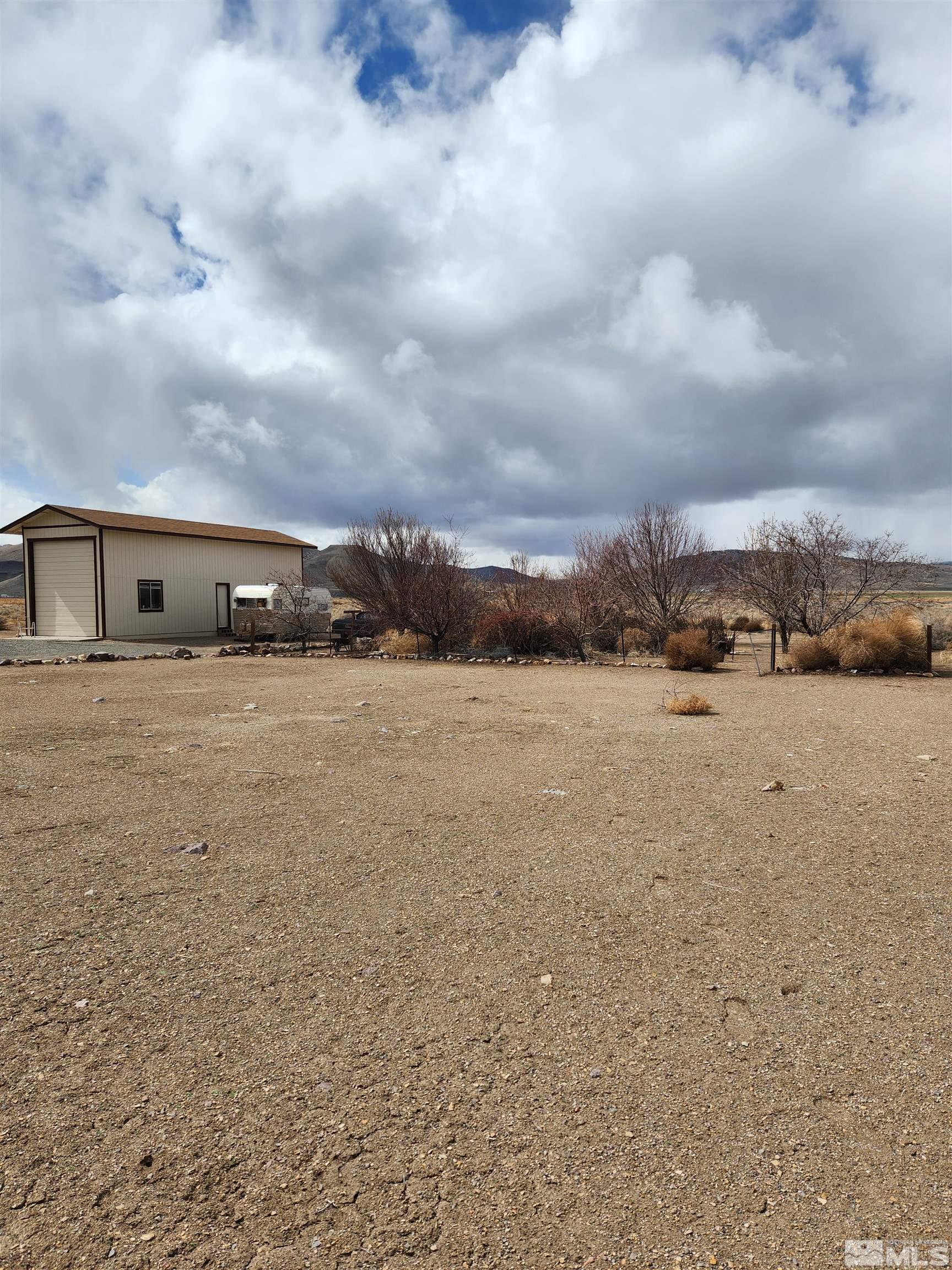 5895 Grass Valley Road Reno, NV 89510 - Photo 4 of 14 a view of large house with yard and ocean view