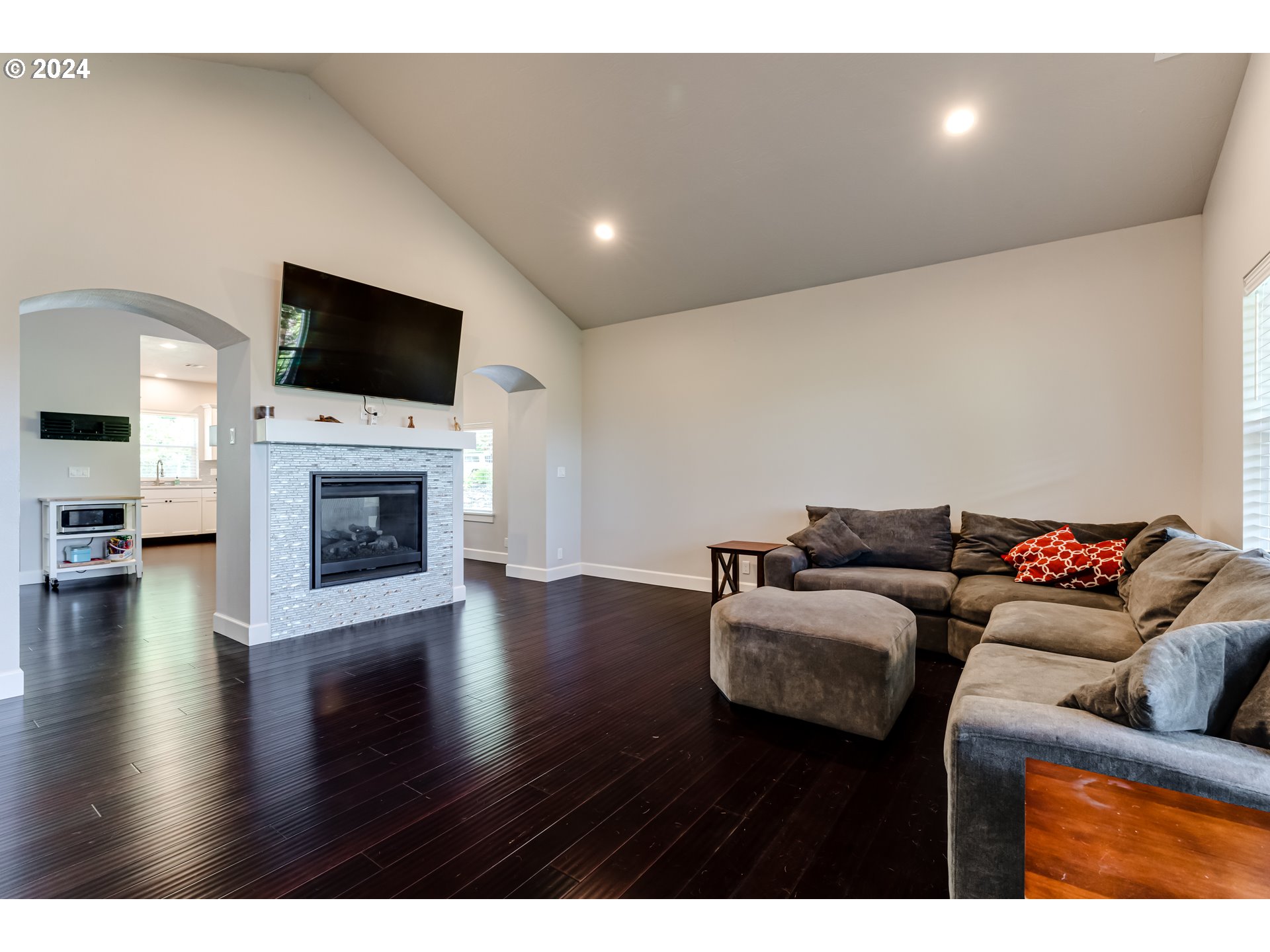 6362 Forest Ridge Drive Springfield, OR 97478 - Photo 12 of 44 a living room with furniture and a flat screen tv