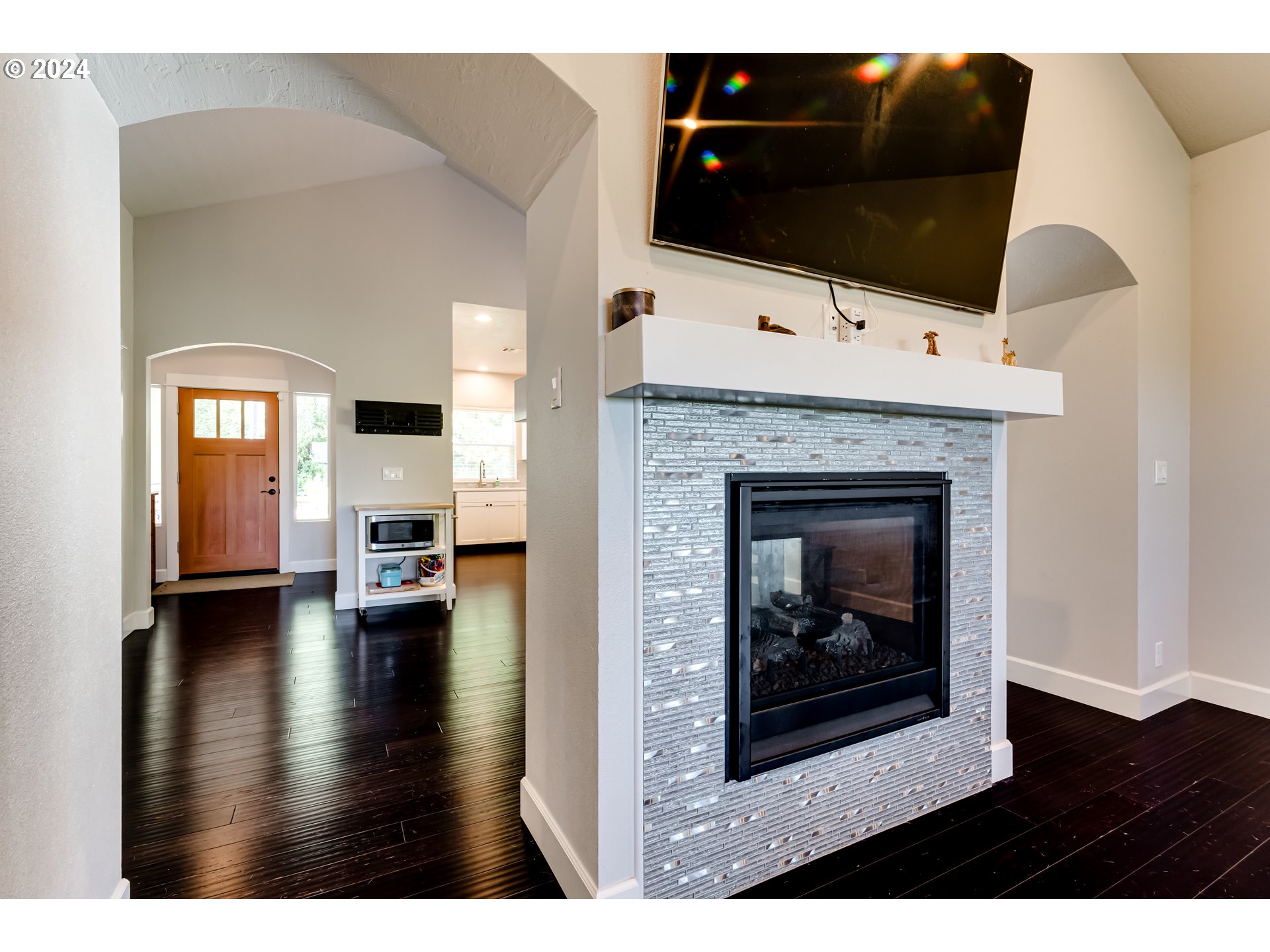 6362 Forest Ridge Drive Springfield, OR 97478 - Photo 15 of 44 a living room with furniture and a fireplace