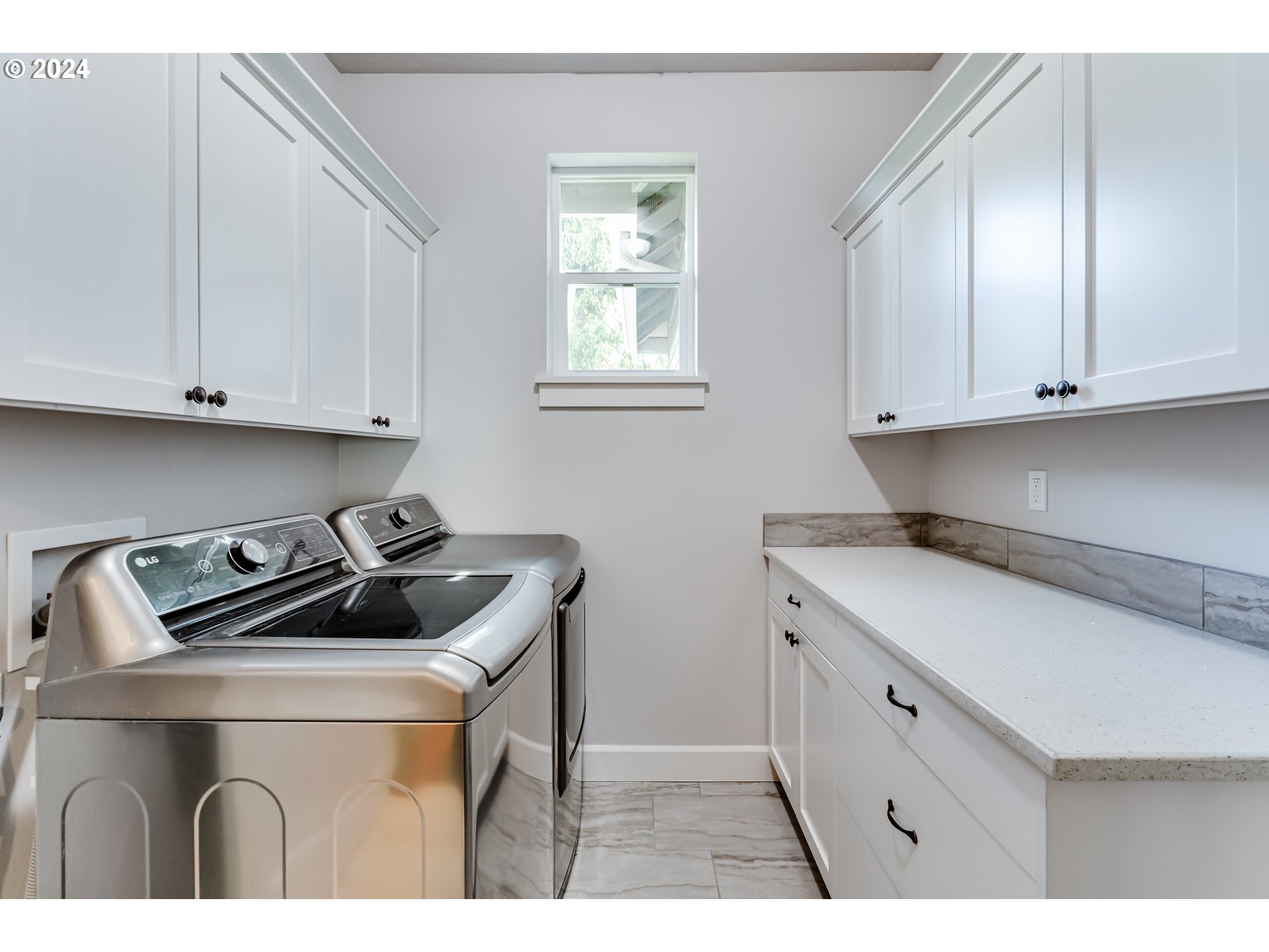 6362 Forest Ridge Drive Springfield, OR 97478 - Photo 20 of 44 a kitchen with white cabinets and sink