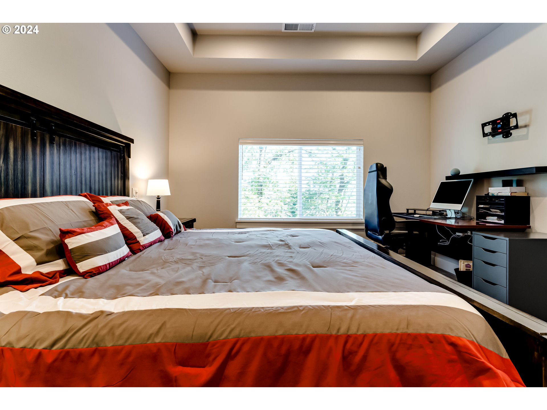 6362 Forest Ridge Drive Springfield, OR 97478 - Photo 21 of 44 a bedroom with a bed and a tv
