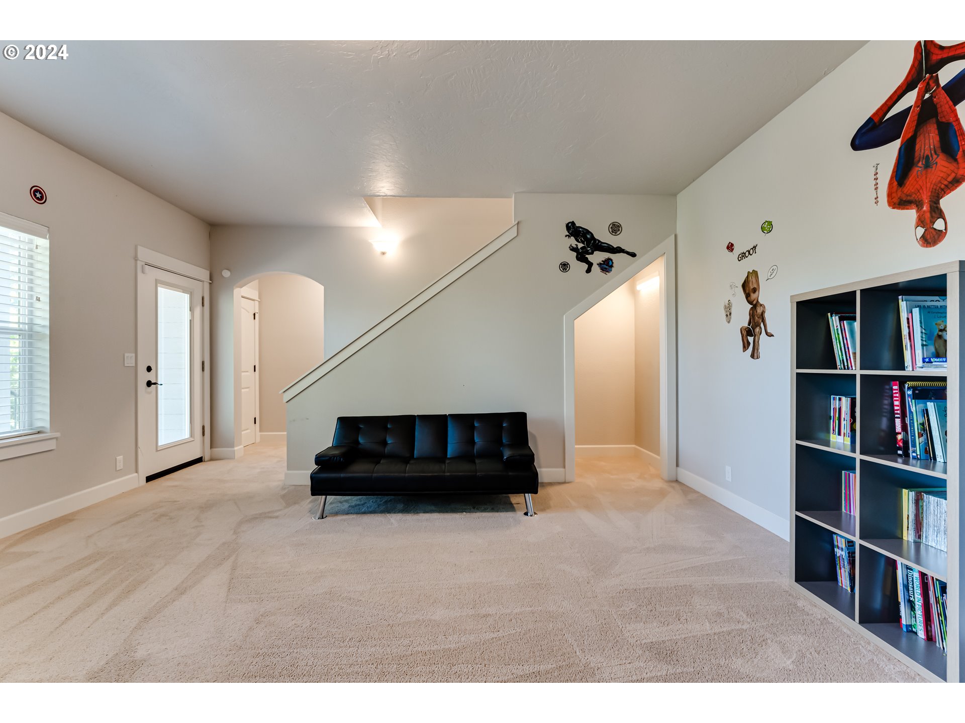6362 Forest Ridge Drive Springfield, OR 97478 - Photo 29 of 44 a living room with furniture and a book shelf