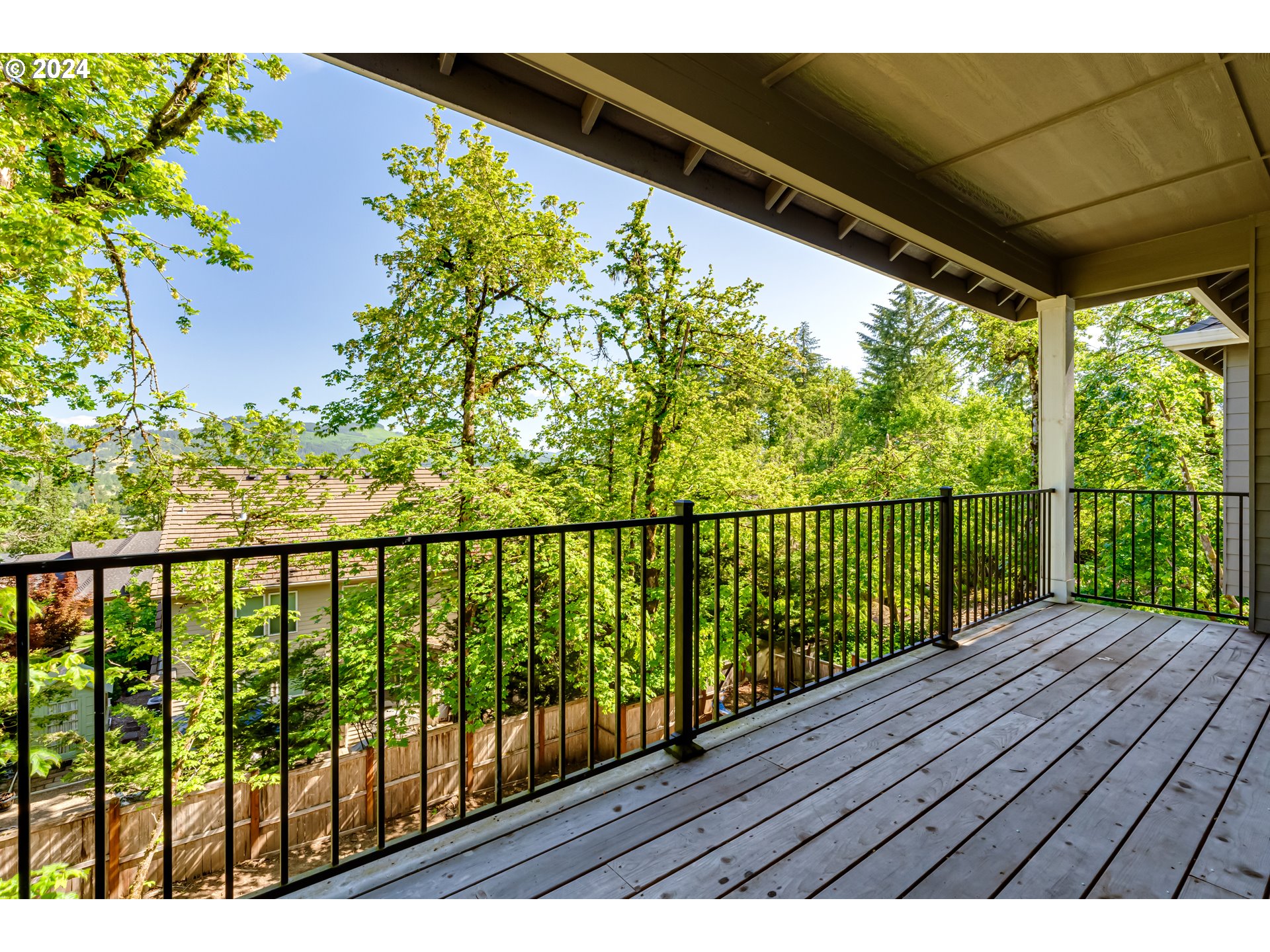 6362 Forest Ridge Drive Springfield, OR 97478 - Photo 41 of 44 a view of balcony with wooden floor